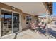 Covered patio with seating area, adjacent to house and features mountain views at 10255 E Golden Rim Cir, Gold Canyon, AZ 85118