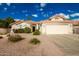 Single-story home with a two-car garage and desert landscaping at 10428 E Hercules Dr, Sun Lakes, AZ 85248