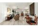 Bright living room with a neutral color palette and wood-look floors at 10428 E Hercules Dr, Sun Lakes, AZ 85248
