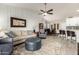Open living area with a neutral color scheme and comfortable seating at 10428 E Hercules Dr, Sun Lakes, AZ 85248