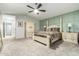 Comfortable main bedroom with ample closet space and ensuite bathroom at 10428 E Hercules Dr, Sun Lakes, AZ 85248