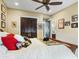 Spacious bedroom featuring dark wood accents and a doorway to the bathroom at 11571 E Cochise Dr, Scottsdale, AZ 85259