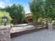 Luxury home with gated entry and mature landscaping at 11571 E Cochise Dr, Scottsdale, AZ 85259