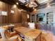 Spacious home office with custom built-ins and leather furnishings at 11571 E Cochise Dr, Scottsdale, AZ 85259