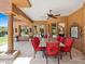 Outdoor patio with seating for eight, offering a relaxing space at 11571 E Cochise Dr, Scottsdale, AZ 85259