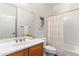 Bathroom featuring a single vanity, shower with curtain, and neutral color palette at 12808 W Nogales Dr, Sun City West, AZ 85375