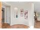 Inviting entryway with decorative niche, artwork, and tiled flooring at 12808 W Nogales Dr, Sun City West, AZ 85375