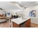 Spacious kitchen overlooking the dining and living areas, featuring a large island at 12808 W Nogales Dr, Sun City West, AZ 85375