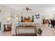 Bright living room with neutral tones, ceiling fan, and tasteful decor at 12808 W Nogales Dr, Sun City West, AZ 85375