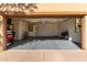 Spacious garage with storage shelving and room for bikes at 13450 E Via Linda Dr # 2008, Scottsdale, AZ 85259