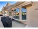 Condo exterior showcasing a bay window and grill at 14300 W Bell Rd # 488, Surprise, AZ 85374