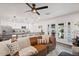 Cozy living room with leather sofa and view of the pool at 1515 E Verlea Dr, Tempe, AZ 85282