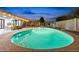 Night view of kidney-shaped pool with illuminated water at 1515 E Verlea Dr, Tempe, AZ 85282