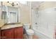 Clean bathroom with granite vanity and a shower/tub combo at 15174 W Camino Estrella Dr, Surprise, AZ 85374