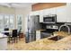 Well-equipped kitchen with stainless steel appliances at 15174 W Camino Estrella Dr, Surprise, AZ 85374