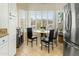Bright kitchen nook features a table and chairs, perfect for casual dining at 15174 W Camino Estrella Dr, Surprise, AZ 85374