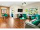 Spacious living room with hardwood floors and comfortable seating at 15174 W Camino Estrella Dr, Surprise, AZ 85374