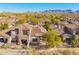 Aerial view of the home and community with mountain views at 19550 N Grayhawk Dr # 1124, Scottsdale, AZ 85255