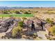 Community overview, showcasing homes with Spanish tile roofs and a golf course view at 19550 N Grayhawk Dr # 1124, Scottsdale, AZ 85255