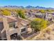 Aerial view of the home and community with mountain views at 19550 N Grayhawk Dr # 1124, Scottsdale, AZ 85255