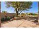 Spacious backyard with seating area and desert landscaping at 19550 N Grayhawk Dr # 1124, Scottsdale, AZ 85255