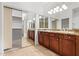 Double vanity bathroom with granite countertops at 19550 N Grayhawk Dr # 1124, Scottsdale, AZ 85255