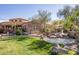 Community clubhouse with a water feature at 19550 N Grayhawk Dr # 1124, Scottsdale, AZ 85255