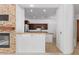 Spacious kitchen with granite countertops and dark wood cabinets at 19550 N Grayhawk Dr # 1124, Scottsdale, AZ 85255