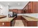 Eat-in kitchen with granite counters and stainless steel appliances at 19550 N Grayhawk Dr # 1124, Scottsdale, AZ 85255