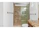 Walk-in shower with tiled walls and glass door at 19550 N Grayhawk Dr # 1124, Scottsdale, AZ 85255