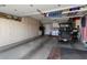 Large garage with ample storage and golf cart at 20532 N Vermillion Cliffs Dr, Surprise, AZ 85387