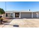 Updated single-story home with a two-car garage and landscaped front yard at 2204 E Edgewood Ave, Mesa, AZ 85204