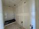 Unfinished bathroom with shower and bathtub at 2216 W Chisum Trl, Phoenix, AZ 85085