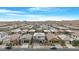 An aerial view of the neighborhood displaying many single Gathering homes, all with desert landscaping at 22501 E Indiana Ave, Queen Creek, AZ 85142