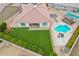 Home's backyard features a pool, putting green and play area at 24147 N 165Th Ln, Surprise, AZ 85387