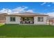 Large backyard with artificial turf and covered patio at 24147 N 165Th Ln, Surprise, AZ 85387