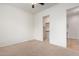 Well-lit bedroom with large closet and ceiling fan at 24147 N 165Th Ln, Surprise, AZ 85387