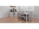 Charming dining area with a farmhouse table and six chairs at 24147 N 165Th Ln, Surprise, AZ 85387
