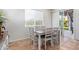 Bright dining area with table and chairs, access to backyard at 24147 N 165Th Ln, Surprise, AZ 85387