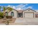 One-story home with attractive facade, two-car garage, and well-maintained landscaping at 24147 N 165Th Ln, Surprise, AZ 85387