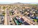 Aerial view of a residential area, highlighting a house with a pool at 2442 E Winged Foot Dr, Chandler, AZ 85249