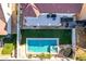 Aerial view showing home with pool, spa, and trampoline in backyard at 2442 E Winged Foot Dr, Chandler, AZ 85249