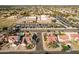 Aerial view of neighborhood including school and homes at 2442 E Winged Foot Dr, Chandler, AZ 85249
