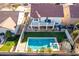 Aerial view showing home with pool, spa, and trampoline in backyard at 2442 E Winged Foot Dr, Chandler, AZ 85249