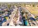 Aerial view of a residential neighborhood with houses, roads, and a park at 2442 E Winged Foot Dr, Chandler, AZ 85249