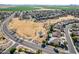 Aerial view of community featuring a park, playground, and residential homes at 2442 E Winged Foot Dr, Chandler, AZ 85249