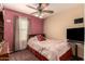 Cozy bedroom with double bed and TV at 2442 E Winged Foot Dr, Chandler, AZ 85249