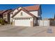 Two-story house with a large garage and gated driveway at 2442 E Winged Foot Dr, Chandler, AZ 85249