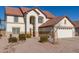 Two-story house with a large garage and landscaped yard at 2442 E Winged Foot Dr, Chandler, AZ 85249
