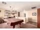 Game room with a pool table and seating at 2442 E Winged Foot Dr, Chandler, AZ 85249